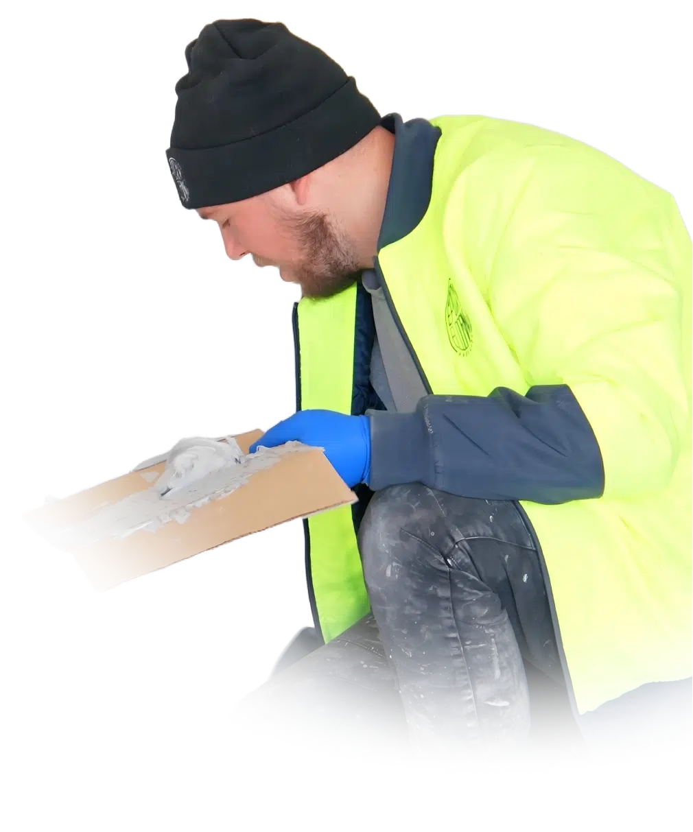 man mixing flooring solution